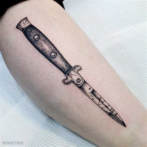 Switchblade tattoo by Monkey Bob - Tattoogrid.net