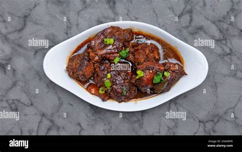 Brown Stew Chicken Jamaican And West Indian Food Stock Photo Alamy