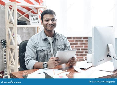 Businessman Work Using The Computer Calculating Invoice In Office