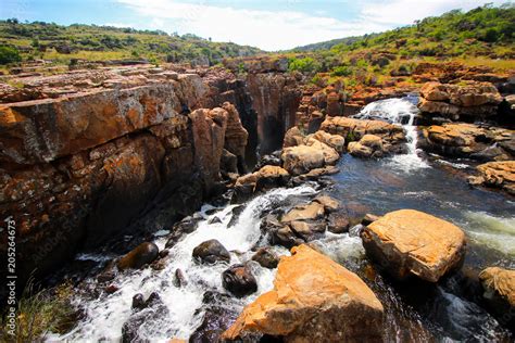 Waterfall At Bourke S Luck Potholes Geological Formation In The Blyde