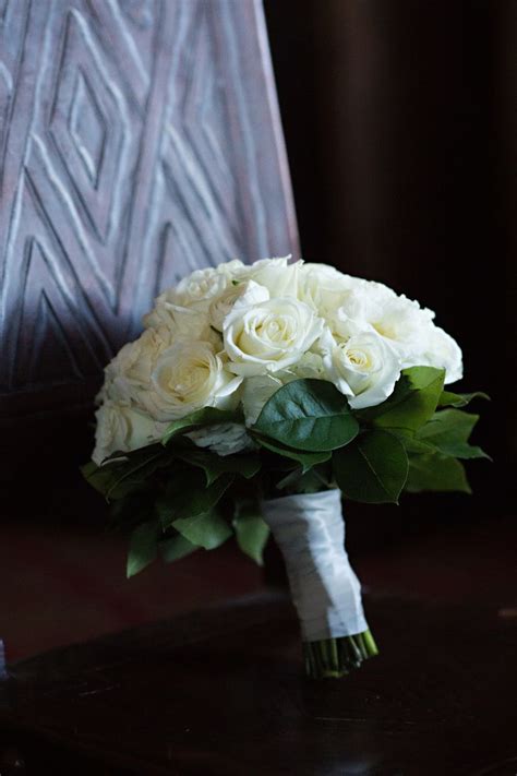 This white rose wedding bouquet is simple but elegant. | White rose ...