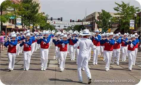 This picture of a band marching in a parade is like when Elsie's ...