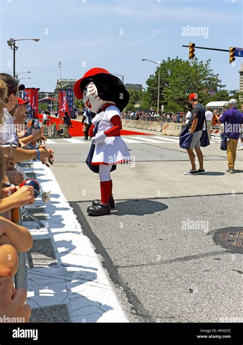 Rosie Red, the female mascot of the MLB Cincinnati Reds, interacts with ...