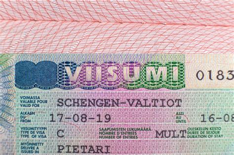 Premium Photo Finnish Visa Stamp In Passport Finnish Schengen