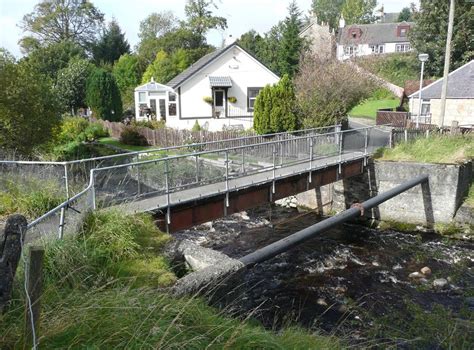 Footbridge And Pipe Bridge Over Muck © Humphrey Bolton Cc By Sa20