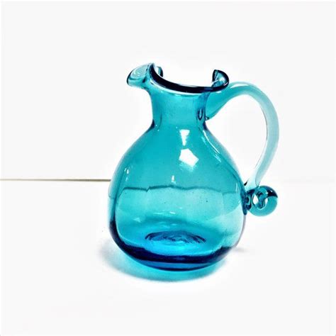 Vintage Blue Glass Pitcher With Applied Handle Window Still Etsy Blue Glass Pitcher Mid