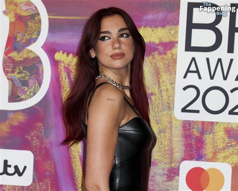 Dua Lipa Flaunts Her Sexy Figure At The Brit Awards In London