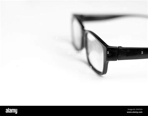 glasses on display at an optician shop white background stock image