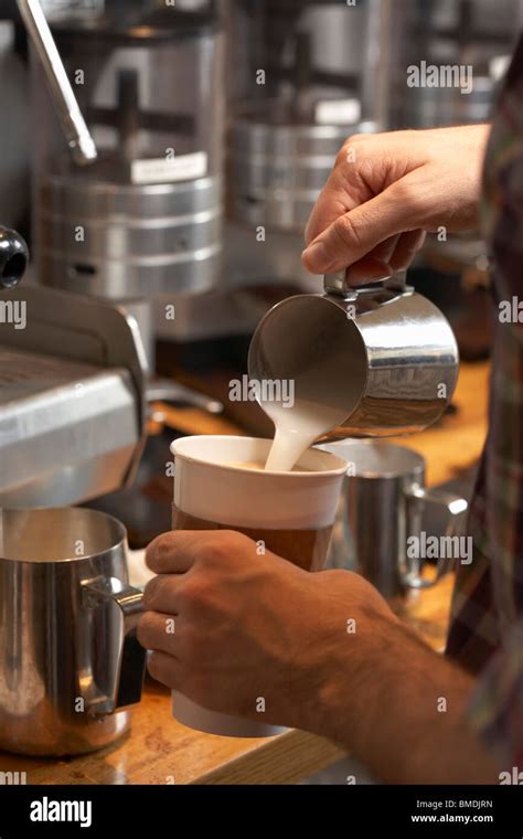 making  latte stock photo alamy