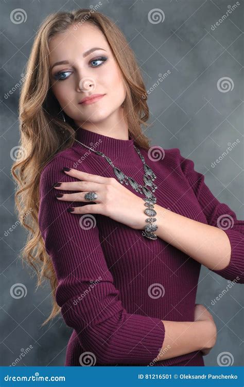 Portrait Of A Beautiful Brunette Woman With Luxury Silver Access Stock