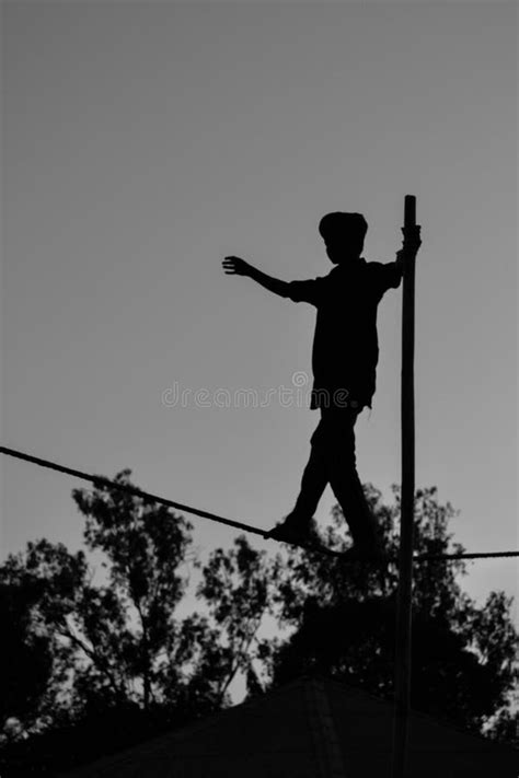 2 Person Balancing Tightrope Free Stock Photos Stockfreeimages