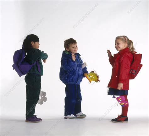 Boy And Girl Waving Goodbye Stock Image C0542350 Science Photo