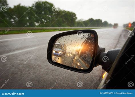 Truck in a Rear View Mirror at Sunset Stock Image - Image of highway, driver: 100393539