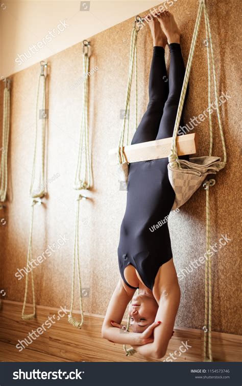 Relaxing Woman Hanging Upside Down On Stock Photo 1154573746 Shutterstock