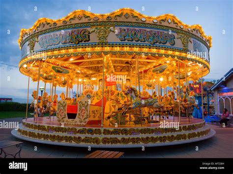 Fairground Carousel Ride At Dusk Weymouth Dorset Stock Photo Alamy