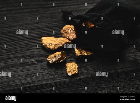 Gold Nuggets Black Background Hi Res Stock Photography And Images Alamy