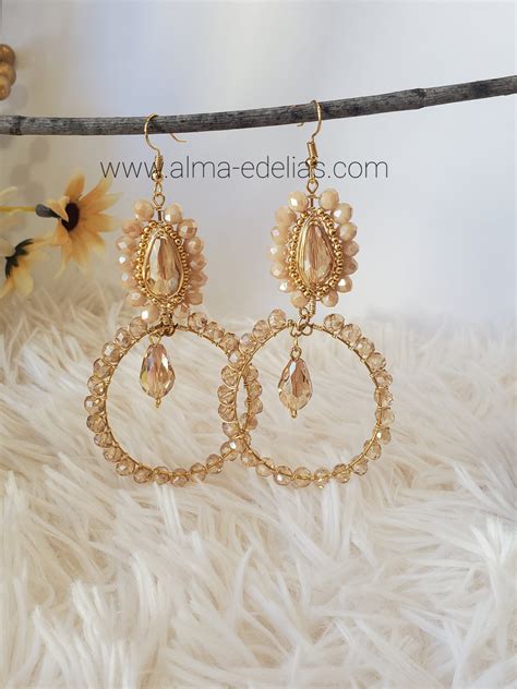 Aretes Redondos Dorados Y Largos 959 ALMA EDELIAS