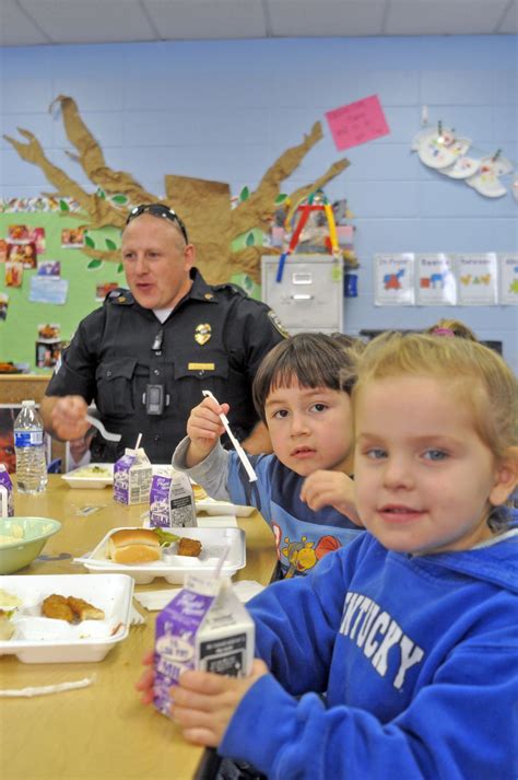 Thin Blue Lunch Police Chat With Students Get Them To Eat Broccoli