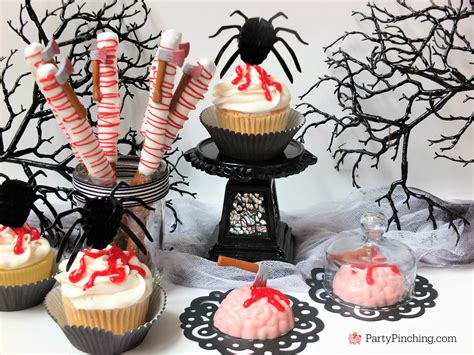 Spooky Halloween Treats Bloody spider cupcakes brain cookies hatchet