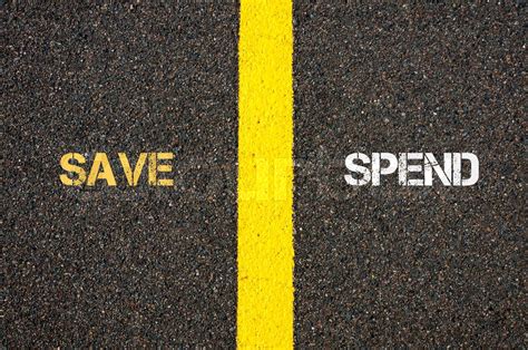 Antonym concept of SAVE versus SPEND | Stock image | Colourbox