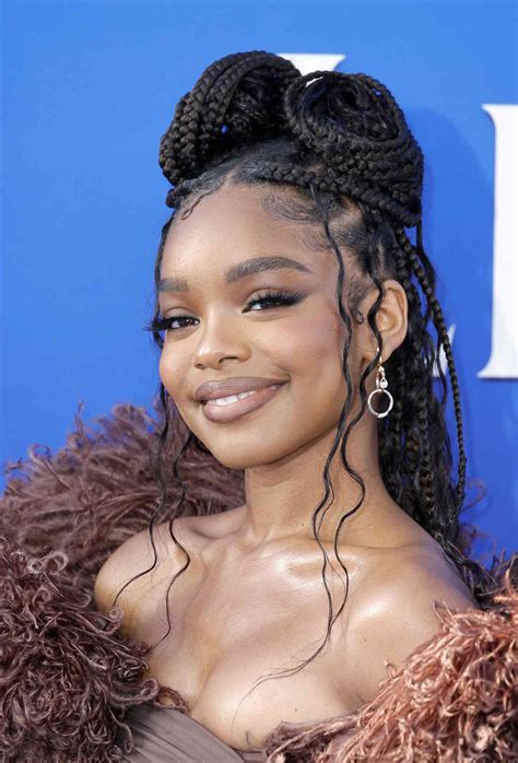 15 Curly Braid Hairstyles That Put A Fun Spin On The Look