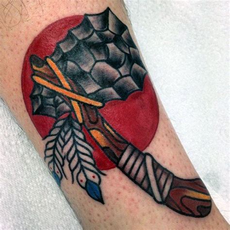 American Indian Tomahawk Tattoo With Red Rising Sun On Mans Arm Red ...