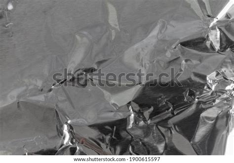 Shiny Crumpled Silver Aluminum Foil Closeup Stock Photo 1900615597