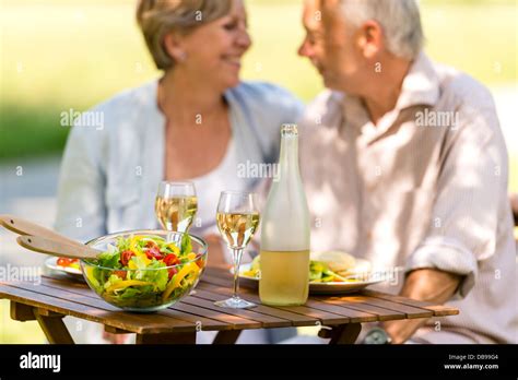 Cheerful Senior Citizens Dating Eating Hi Res Stock Photography And