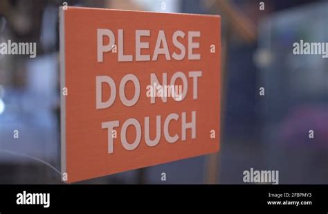 Please Do Not Touch Sign On Glass Casing Of Museum Display 4k Stock