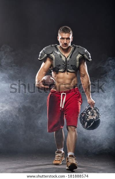 American Football Player Posing Stock Photo Edit Now