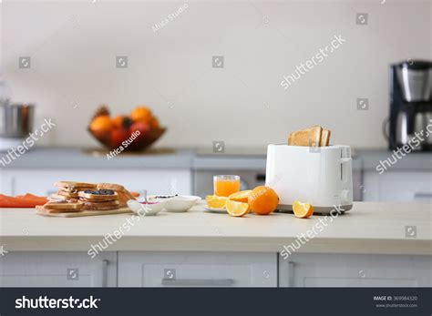 520 Toaster With Tasty Food And Drink On Table In Modern Kitchen Images