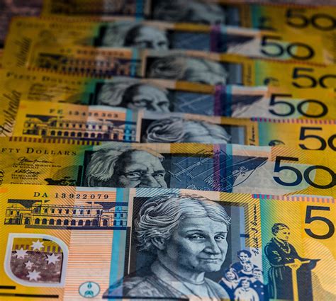 AUD to USD Forecast – Forbes Advisor Australia