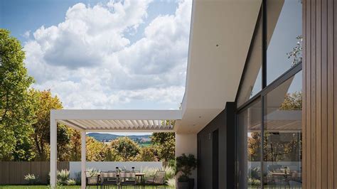 An Outdoor Dining Area With Table And Chairs