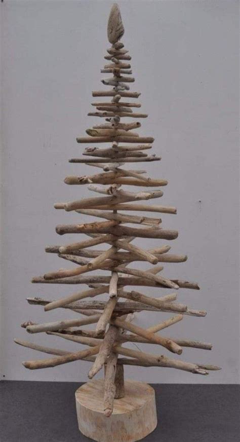 A Wooden Christmas Tree Made Out Of Driftwood