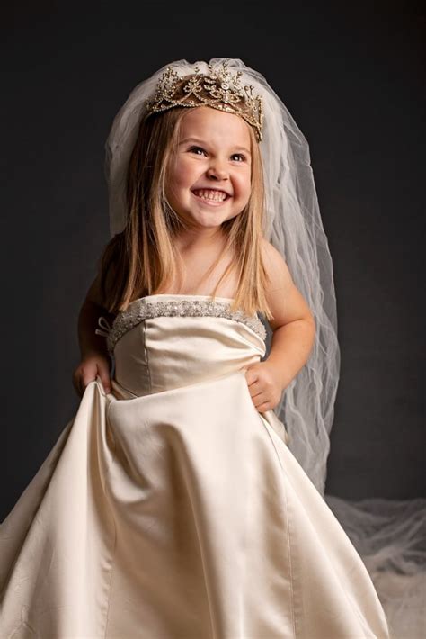 Dress-Up Photos for Little Girl in Her Mother's Wedding Dress