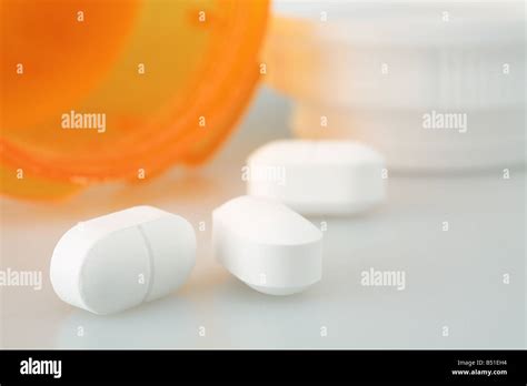 White Pills And Orange Bottle Stock Photo Alamy