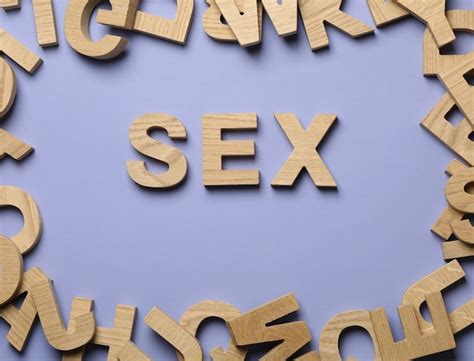 Premium Photo Word Sex And Wooden Letters On Violet Wall