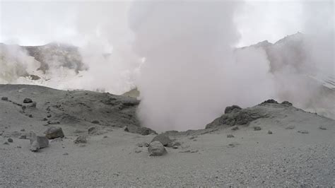 Volcanic activity - boiling thermal mud pot in crater active volcano 22654864 Stock Video at ...