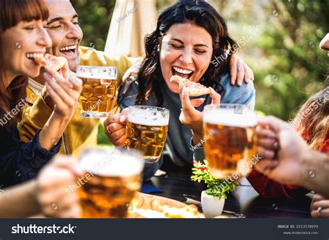 Happy Friends Eating Pizza Beer Garden Stock Photo 2213578979 ...