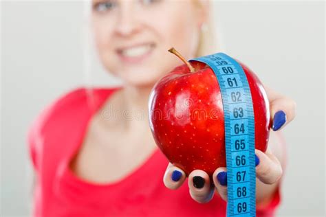 Happy Woman Holding Apple And Measuring Tape Stock Image Image Of