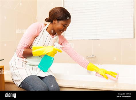 Black Female Cleaning Home Hi Res Stock Photography And Images Alamy