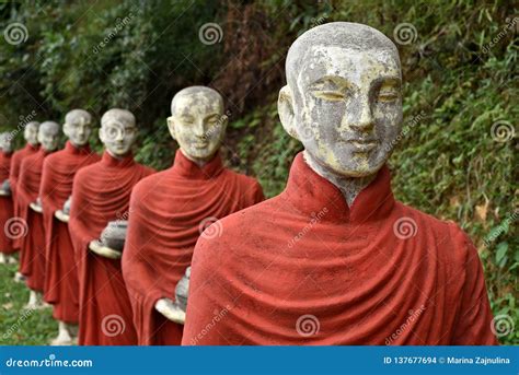 A Row Of Colorful Buddhist Monk Statues Hpa An Myanmar Stock Photo