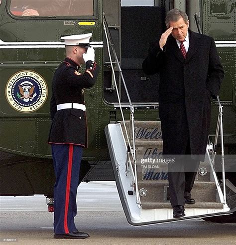 Us President George W Bush Salutes His Marine Guard As He Leaves