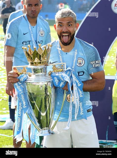 Manchester Citys Sergio Aguero Lifts The Premier League Trophy After