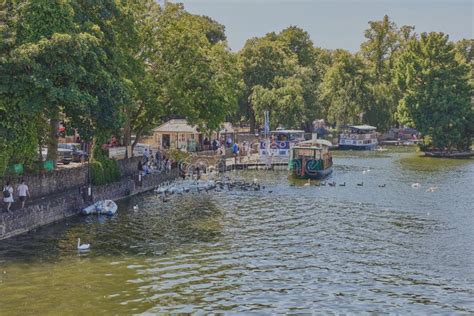 A Tourist Boat Cruise Pier By The River Thames Located Between The