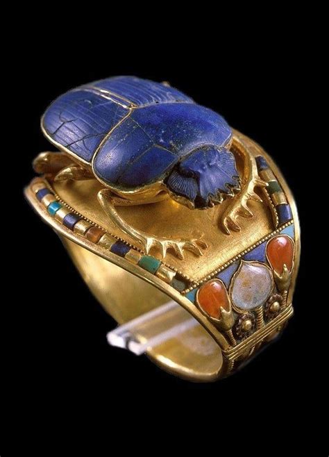 A Gold Egyptian Scarab Bracelet From The Tomb Of King Tutankhamun KV62