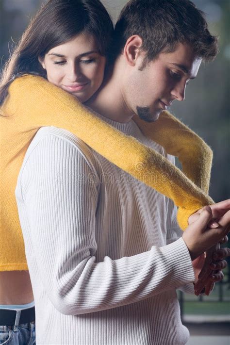 Young Couple Embracing Outdoors