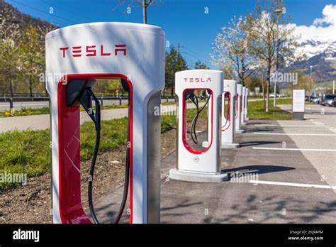 Tesla Superchargers On A Parking Lot Stock Photo Alamy
