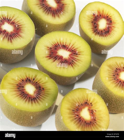 Red Kiwi Fruit Cut In Half Stock Photo Alamy