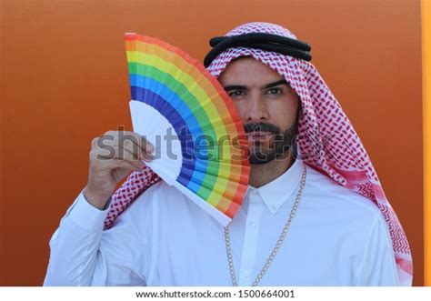 Photo De Stock Attractive Arabic Gay Man Holding Fan Shutterstock